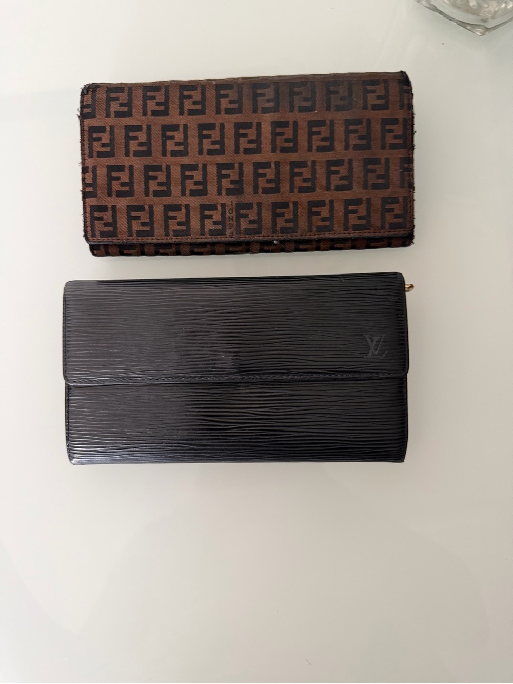 Louis Vuitton Black Epi Leather Zip and Fendi wallet. Snap button very weak